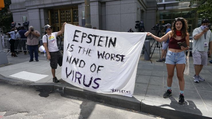 Protestors laine Maxwell