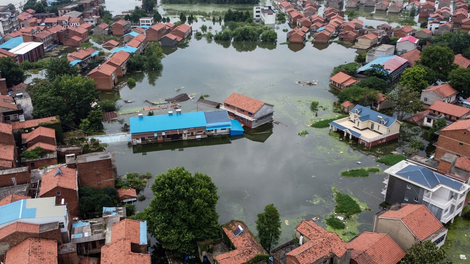 Click to enlarge Rising water levels of the Yangtze river in Jiujiang, in China's central Jiangxi province