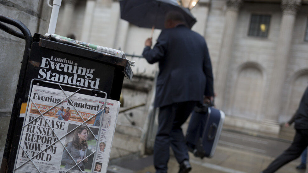 Click to enlarge Copies of the London Evening Standard newspaper