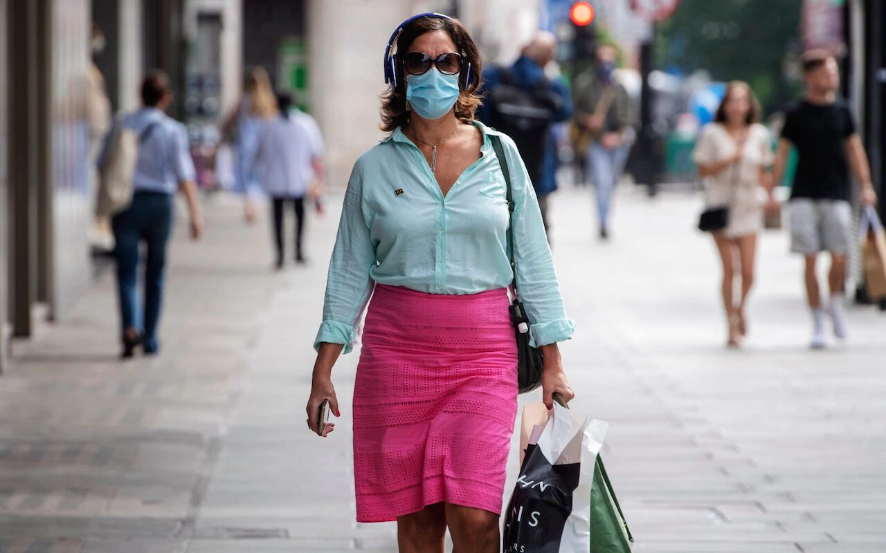 Click to enlarge masked shopper