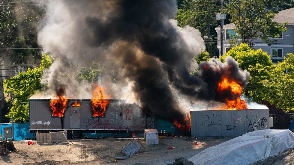 Click to enlarge riot seattle arson fire youth center