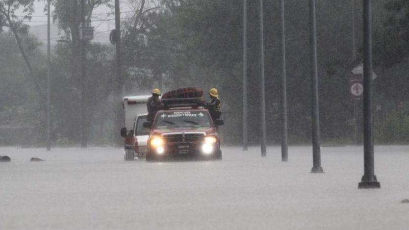 Click to enlarge In Apodaca, the fire service had to tow an ambulance which got stuck in the floods