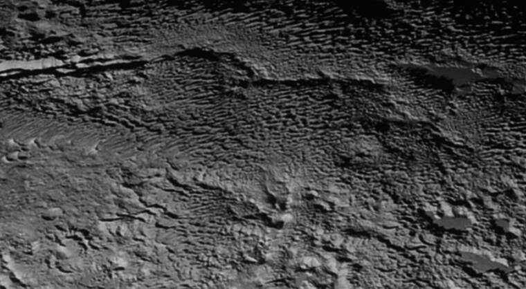 Click to enlarge Pluto