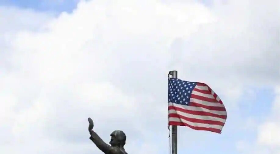 american flag bill clinton statue