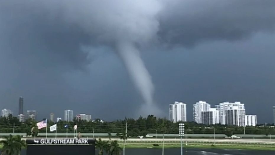 Click to enlarge Multiple Florida residents captured video of a waterspout sliding up the coast.