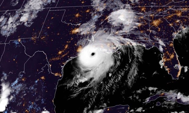 A satellite image shows Hurricane Laura reaching the coasts of Louisana and Texas
