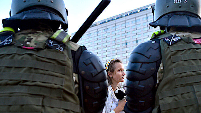 2 guards and a woman