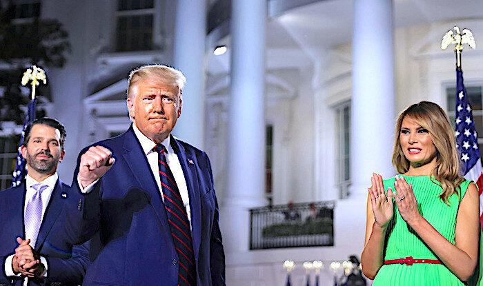 Click to enlarge Trump, Melania, Don JR.
