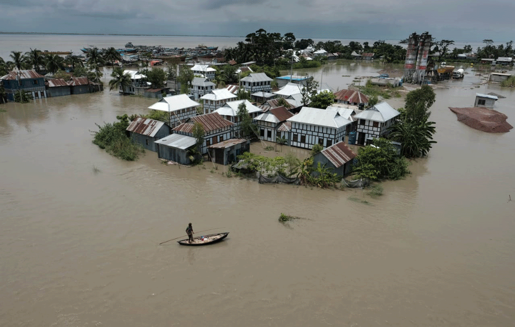 Floodwater has inundated a village at Louhajang upazila in Munshiganj, making access to food and safe water extremely difficult for the villagers. The photo was taken on Thursday, July 23, 2020