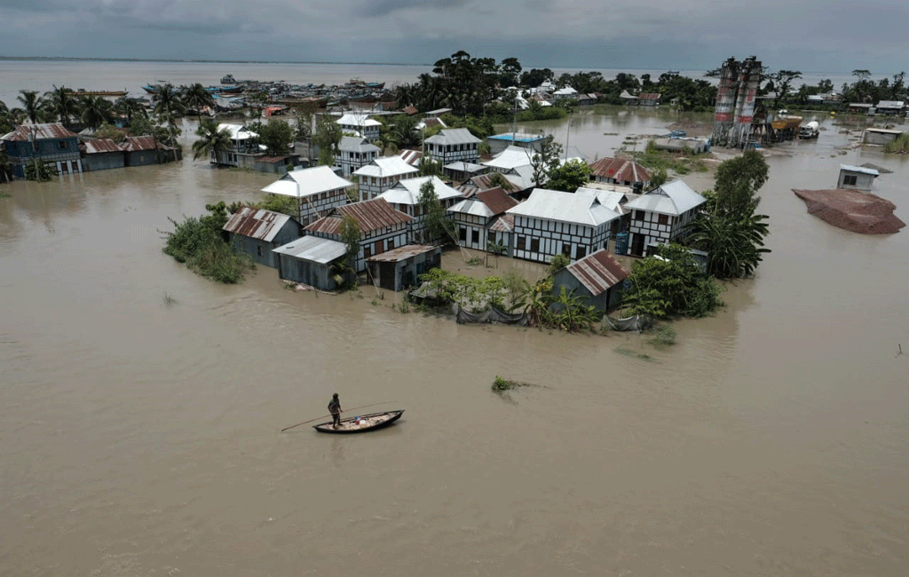Click to enlarge Floodwater has inundated a village at Louhajang upazila in Munshiganj, making access to food and safe water extremely difficult for the villagers. The photo was taken on Thursday, July 23, 2020