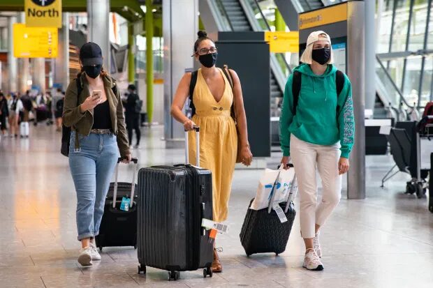 Click to enlarge UK quarantine masks airport
