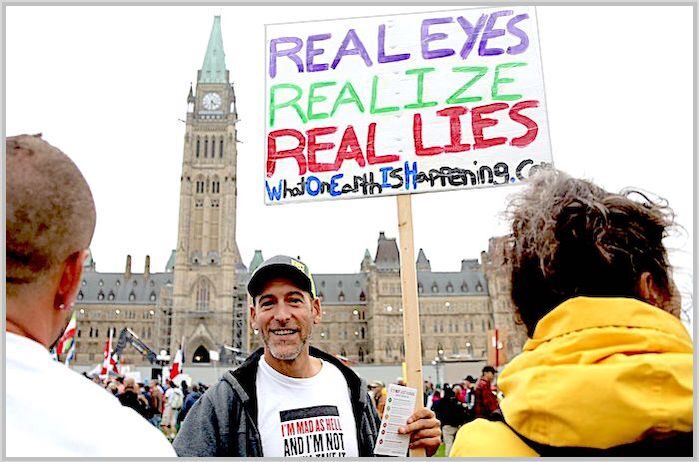 Click to enlarge guy with a sign