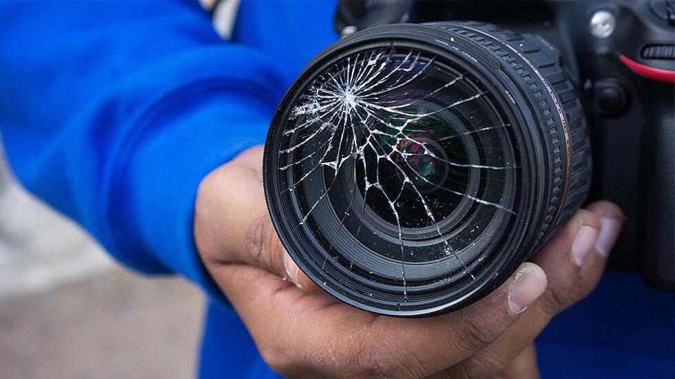Click to enlarge camera lens damage media journalism