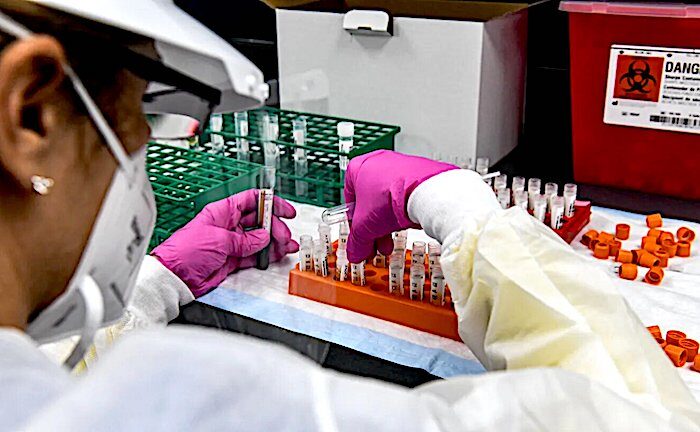 Click to enlarge tech and vials