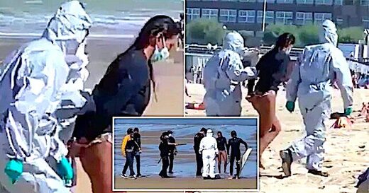Surfer handcuffed on beach for going into sea while infected with coronavirus