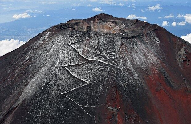 A dusting of snow is seen near the summit of Mount Fuji on Sept. 21, 2020.