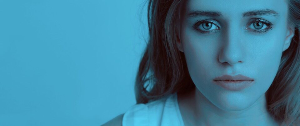 woman blue background