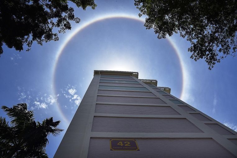 Click to enlarge Sun halo over Singapore
