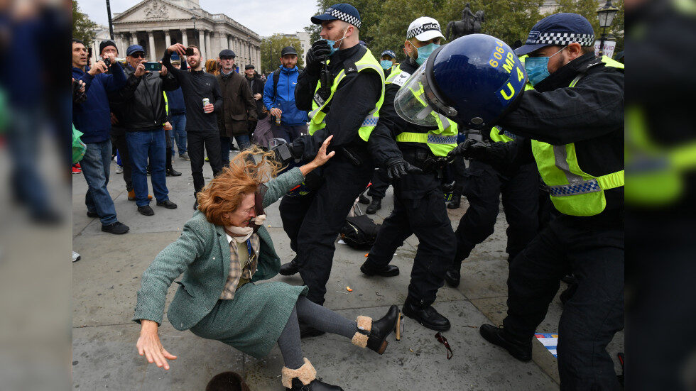 Click to enlarge woman knocked over police