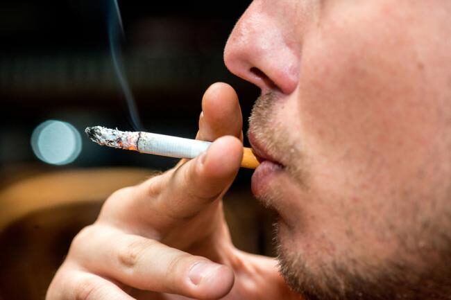 Click to enlarge Smoking man
