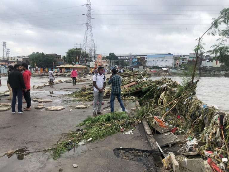 Debris left by the overflowing Musi river after it swamped the Chaderghat bridge in Hyderabad city.