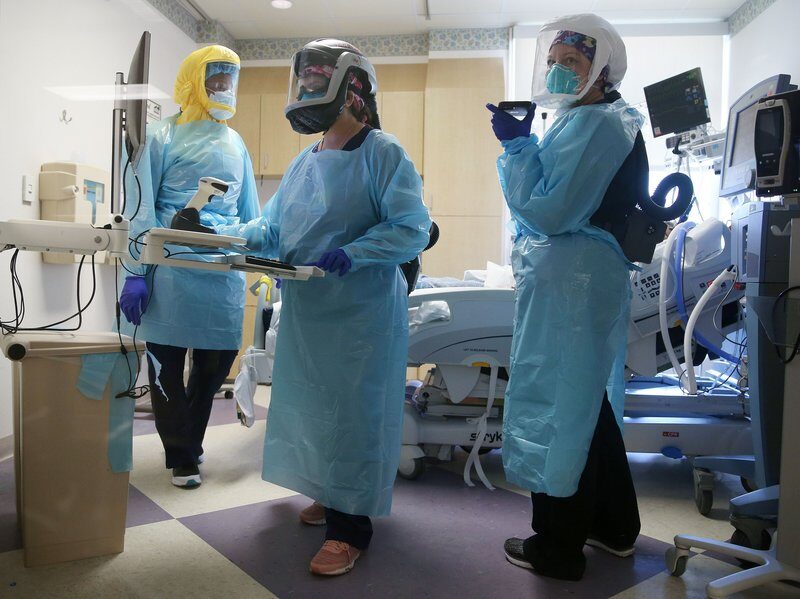 Click to enlarge covid hospital staff PPE