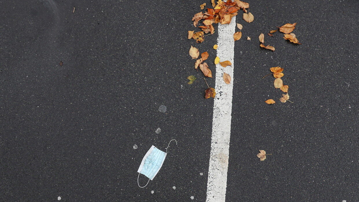 discarded mask litter