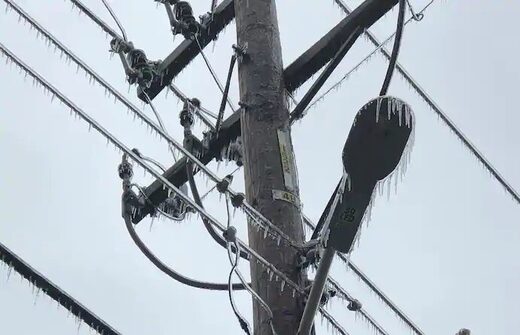 Icicles hang from power lines and poles Tuesday in Oklahoma City