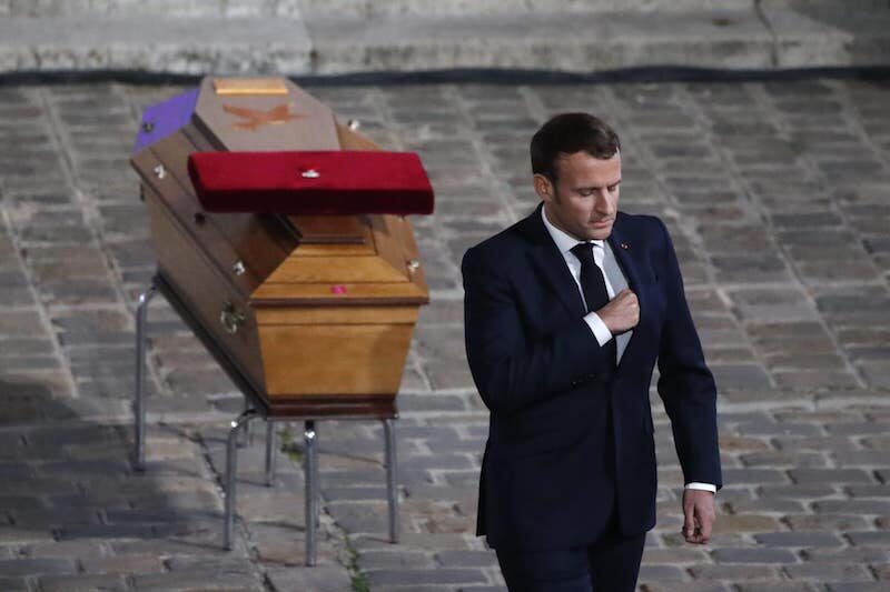 Click to enlarge Macron at funeral