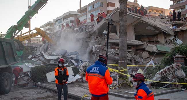 Click to enlarge Search and rescue teams search the rumble of a collapsed building for survivors on October 31, 2020, in Izmir, after a powerful earthquake struck Turkey’s western coast and parts of Greece.