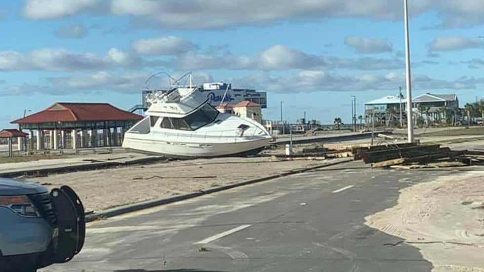 A large boat sits on U.S. Highway 90 in Long Beach, Mississippi, on Thursday, Oct. 29, 2020, after Hurricane Zeta roared through the state.