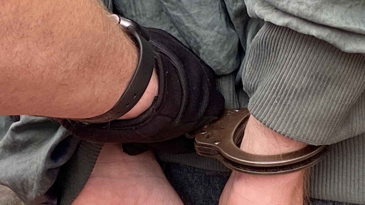 handcuffed perp