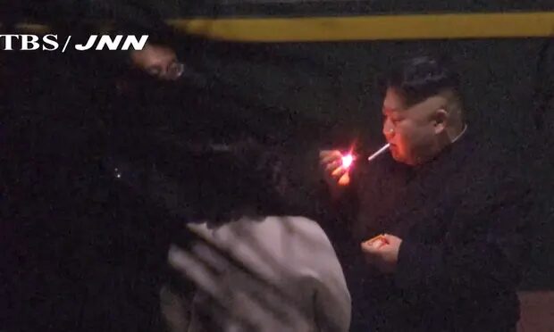 Click to enlarge smoking kim jong un