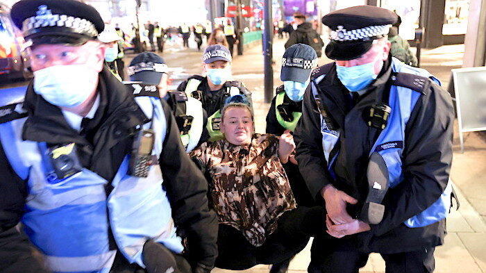 Click to enlarge Protestor arrested