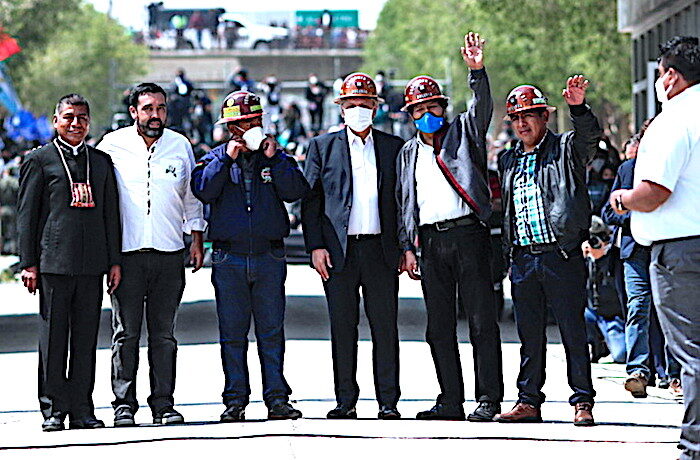 Click to enlarge Morales and group