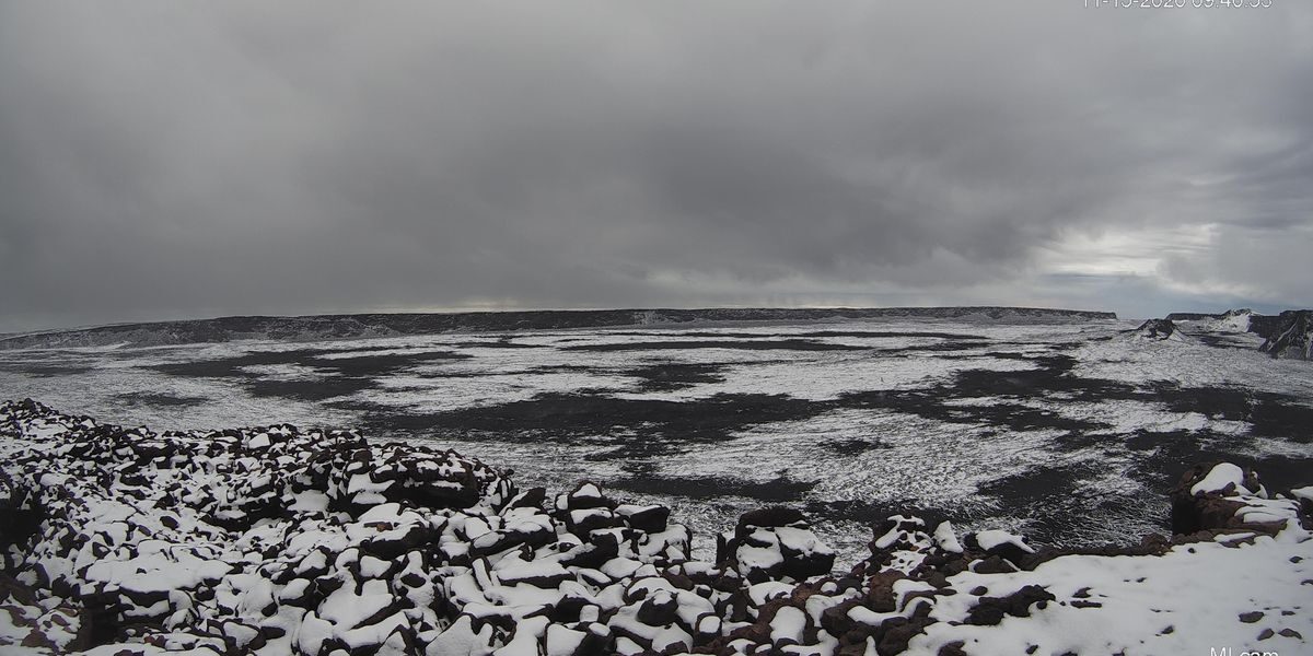 Click to enlarge A webcam at the summit of Mauna Loa shows a dusting of snow at at Mokuʻāweoweo caldera.