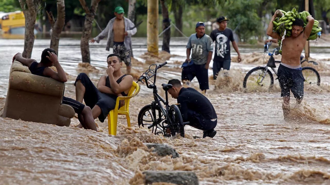 Click to enlarge A flooded street in El Progreso, in Honduras' Yoro department, after the passage of Hurricane Iota.