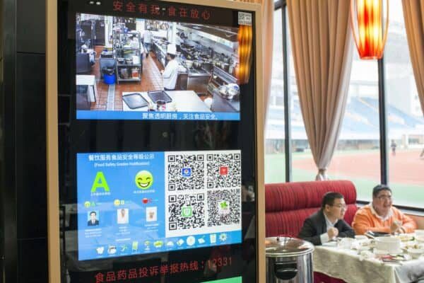 Click to enlarge Diners eat lunch near a restaurant ‘sincerity display’