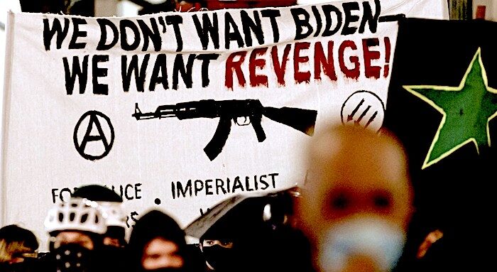 Click to enlarge protest sign