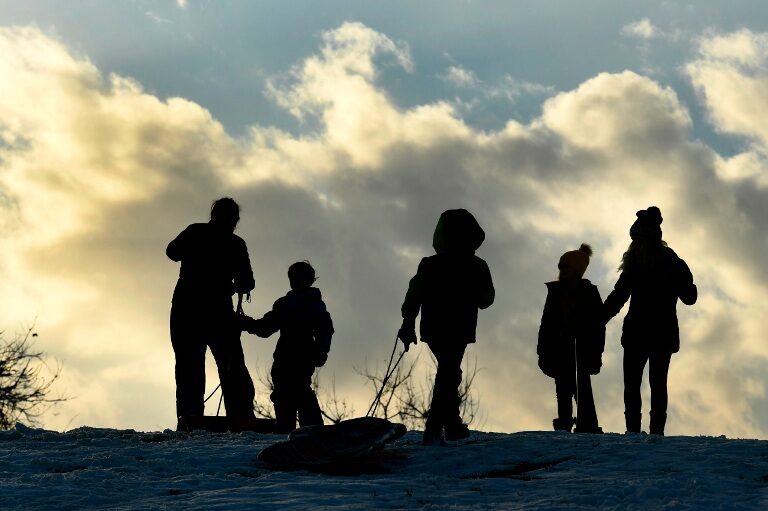 Click to enlarge Children sledding