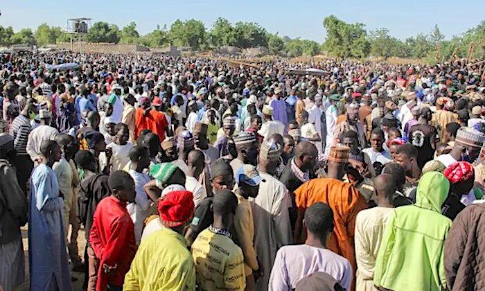 Click to enlarge Funeral crowd
