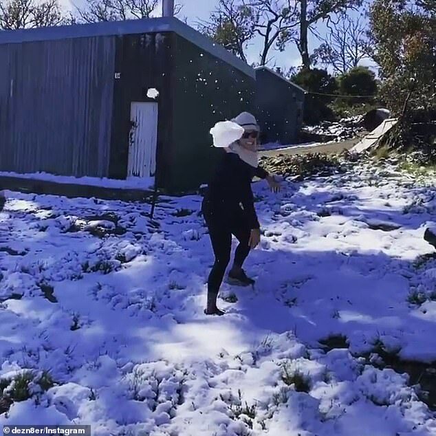Click to enlarge Residents in Tasmania woke up to snow (pictured) while the rest of the country sweltered through a heatwave