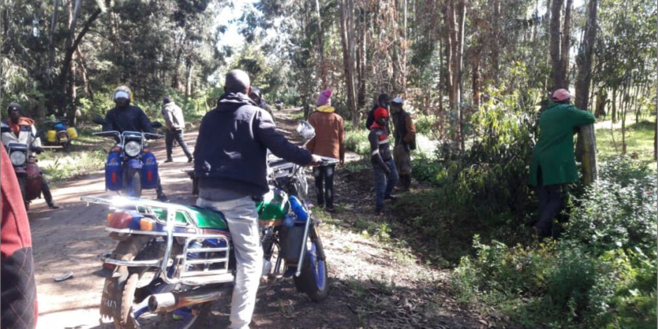 Some residents of Kiandugui Village in Kibirichia, Meru County at the scene where the body of a man said to have been killed by a pack of dogs was found on December 2, 2020.