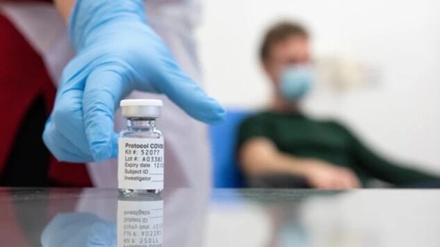 Click to enlarge A vial of a COVID-19 candidate vaccine
