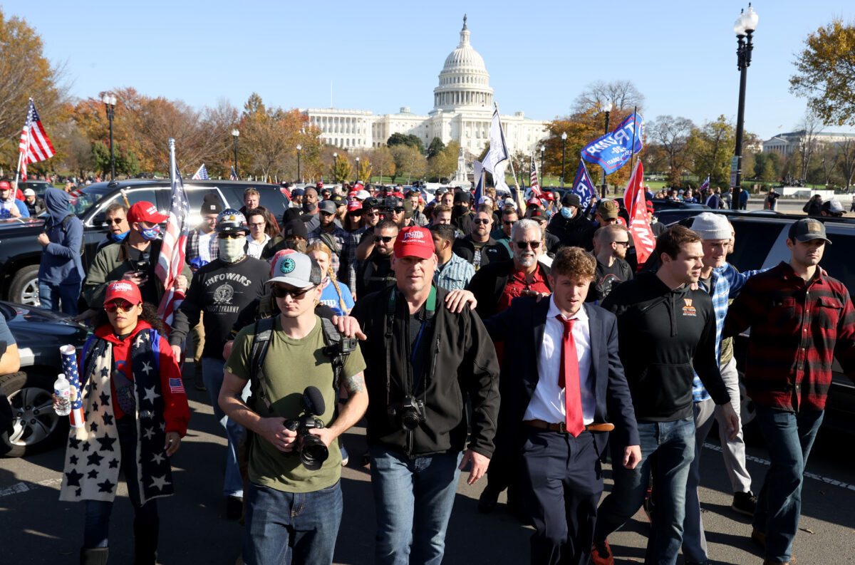 People participate in the “Million MAGA March”
