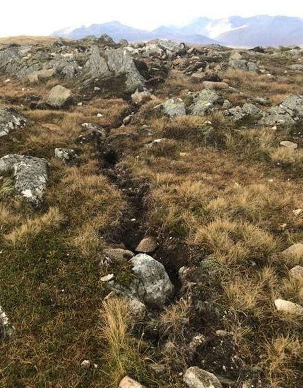 Channels and dislodged boulders were found near the summit of Leum Uilleim