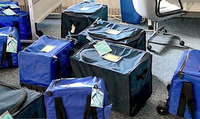 Click to enlarge Cases of ballots
