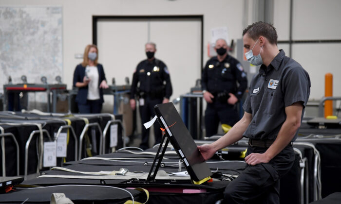 Click to enlarge County election worker