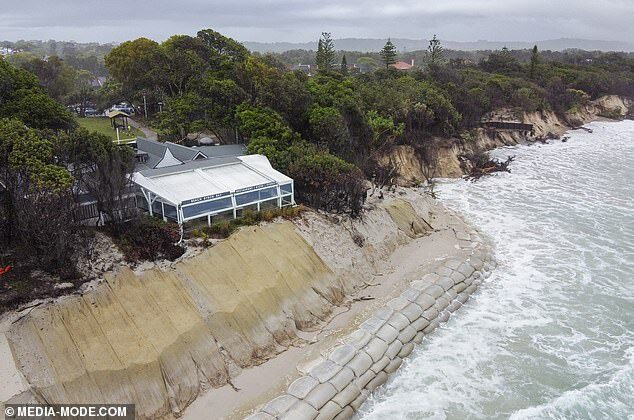 Holiday meccas like the Sunshine Coast, Byron Bay and the New South Wales north coast have been washed out (pictured, Byron Bay on Tuesday)