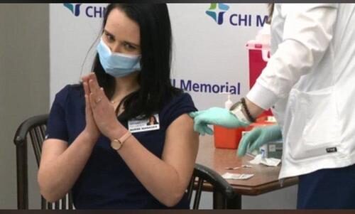 nurse gets vaccine